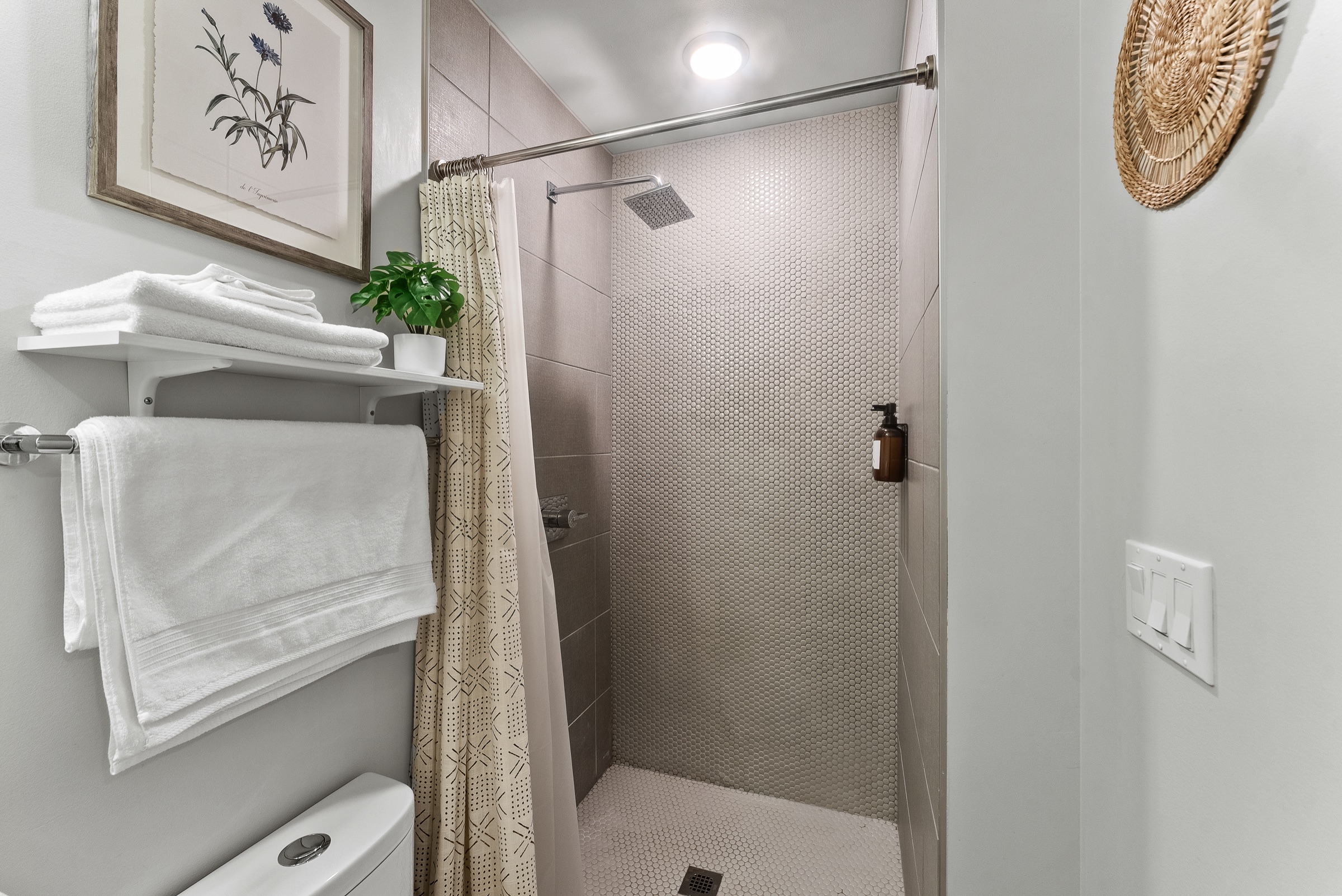 Walk-in tiled shower with rainfall head