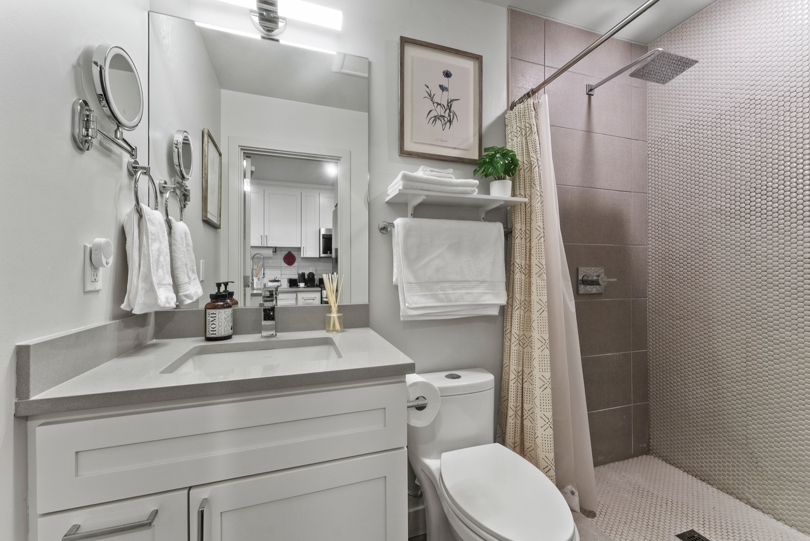 Bathroom with vanity and walk-in shower