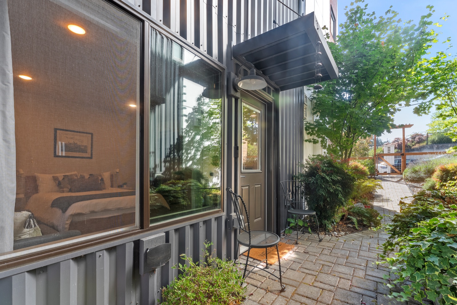 Private patio at the entrance, evening light